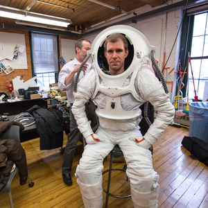 Andrzej Stewart, the chief engineering officer on the Mars simulation mission that ended this past August, suits up in the newly-designed spacesuit. 