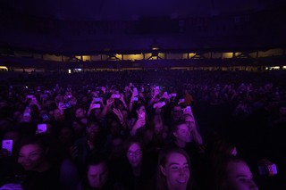 Audience members were fully engaged in The 1975's set, singing and dancing along to the band's energetic tracks.